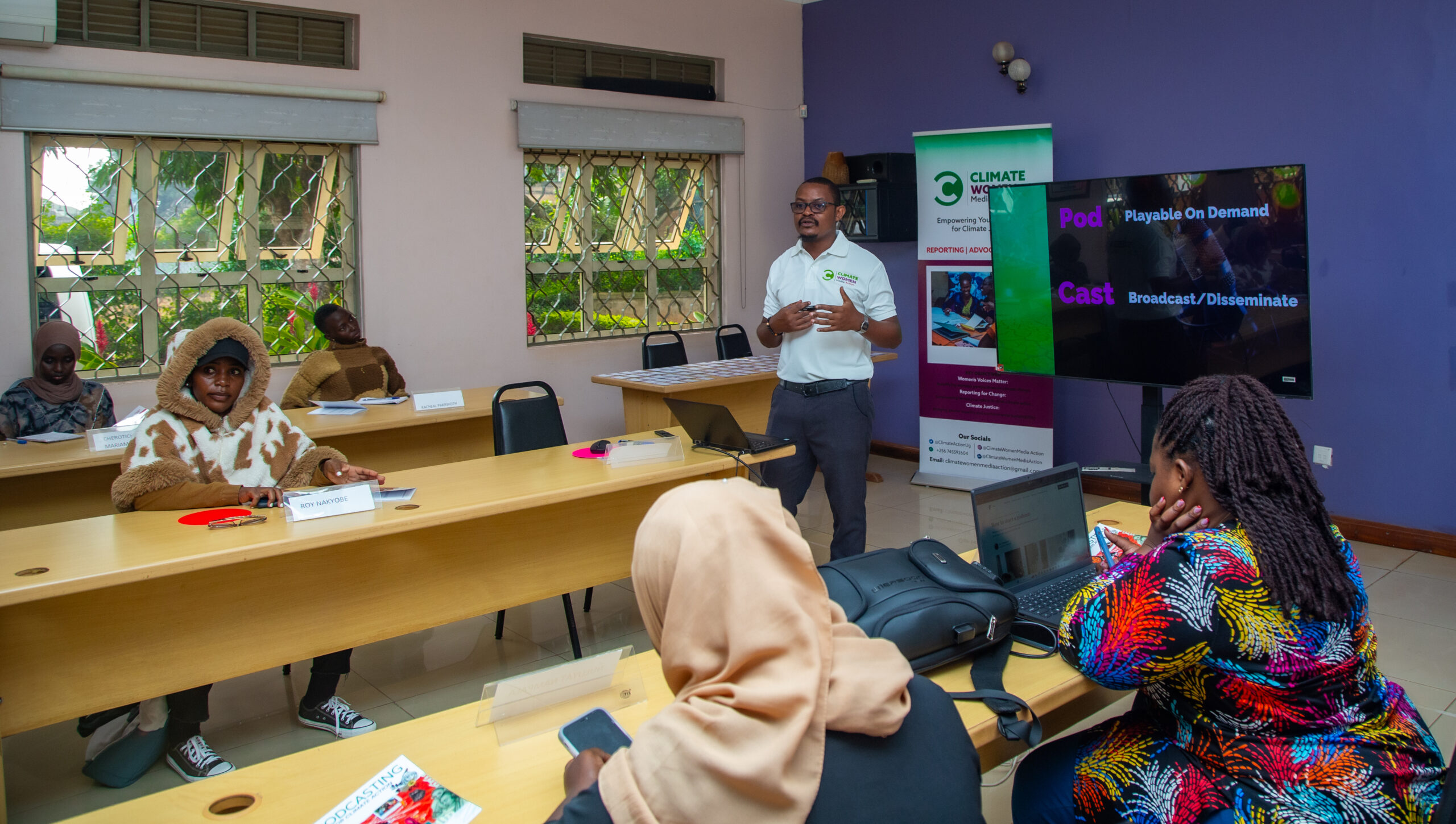Tumwine Edward leads a session on podcasting for climate storytelling